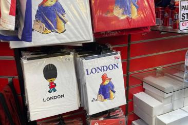 Counterfeit white and red Paddington Bear t-shirts on display before being seized as part of a raid on Oxford Street