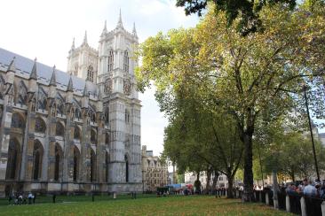 Westminster Abbey with green trees in the foreground