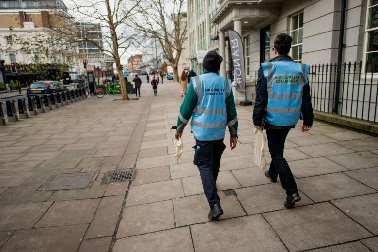 Air quality champions walking on the street