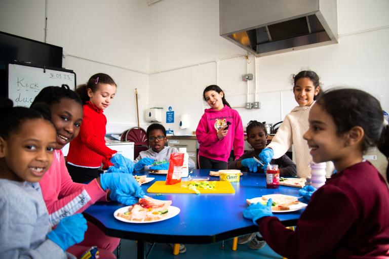 Children enjoying lunch together in school holidays 