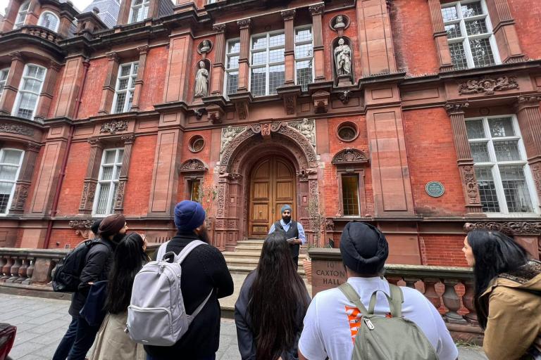 A group of people taking part in a partition walking tour