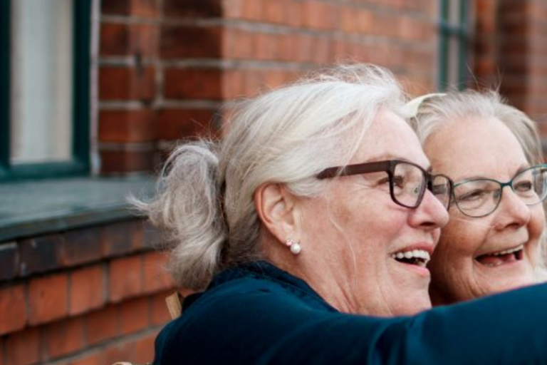 two older ladies taking photo