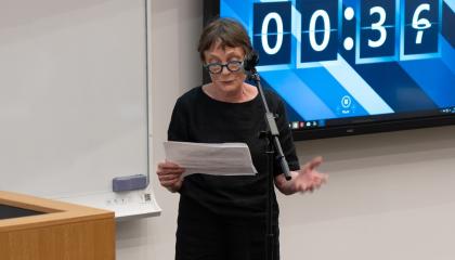 Linda asking her question in the council chamber