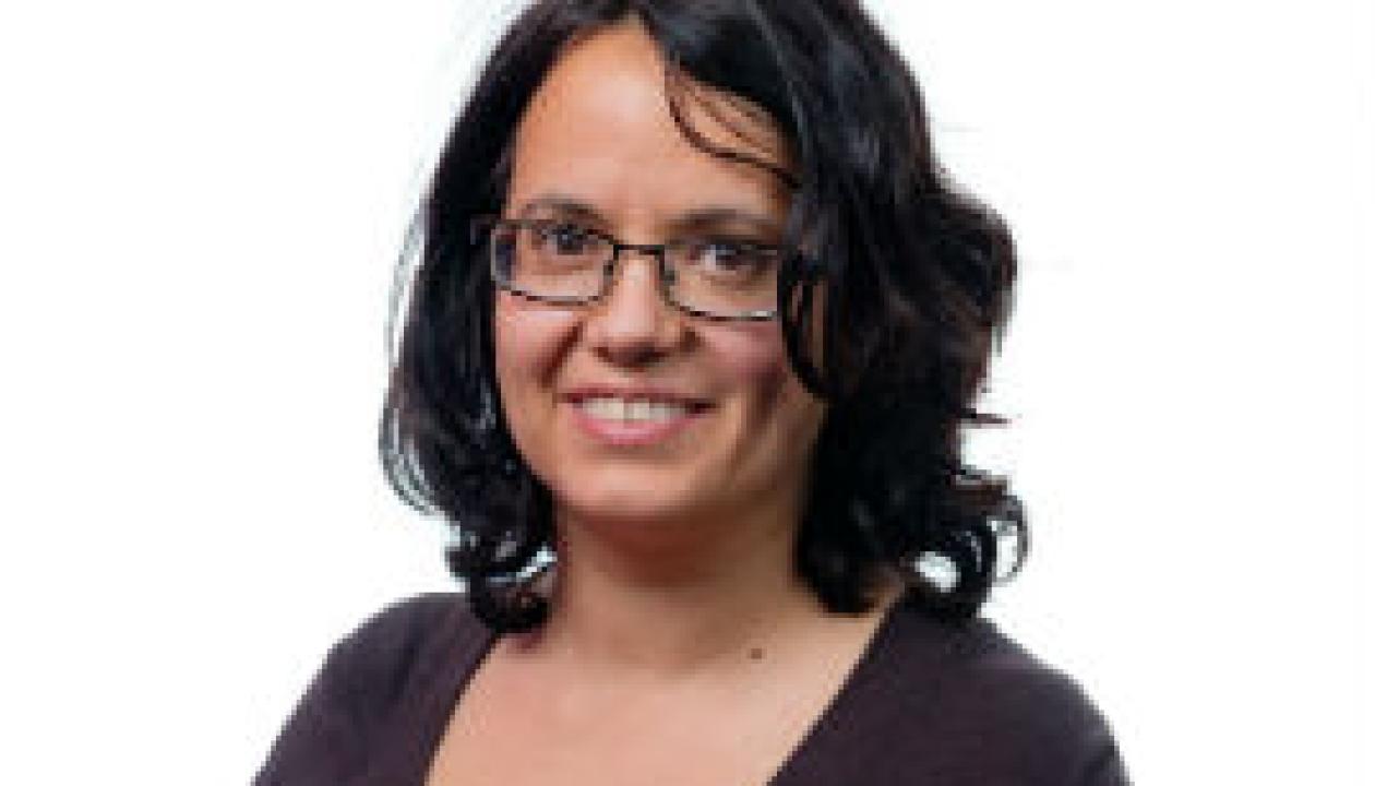 A headshot of Councillor Nafsika Butler-Thalassis smiling at the camera